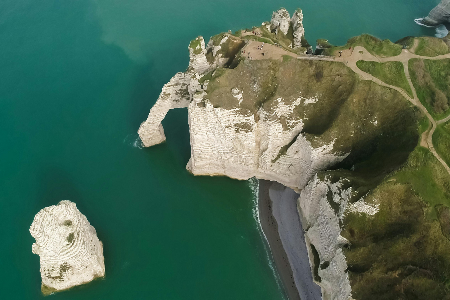 Étretat drone footage normandy landscapes green grass blue water excursion day trip from Paris