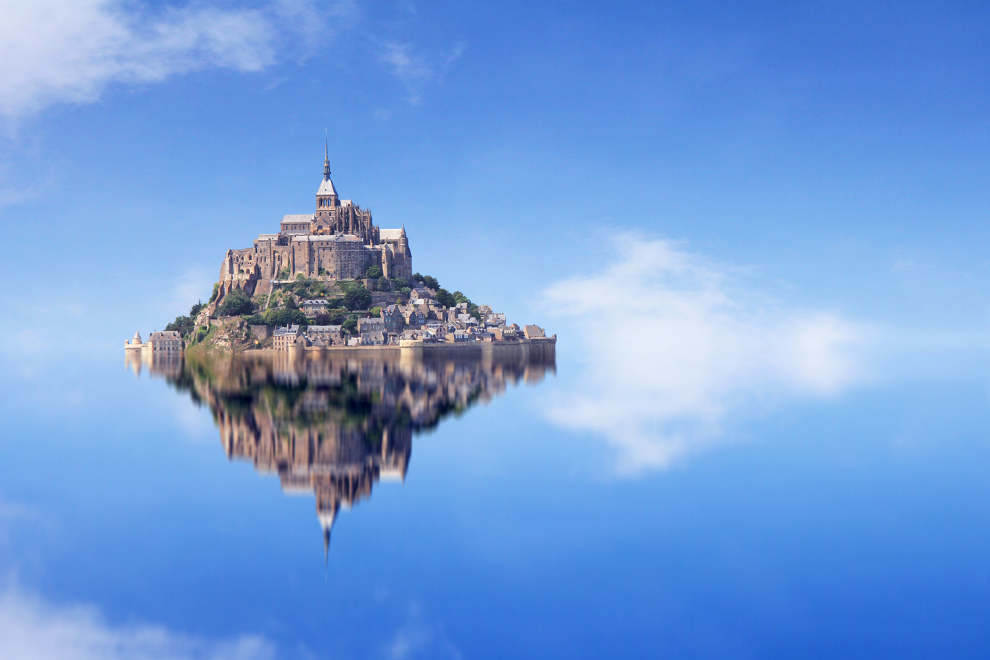 Mont Saint-Michel island floating on the blue water day trip from Paris excursion
