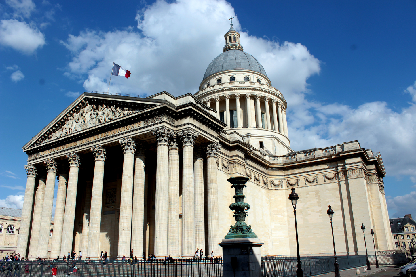 The Paris Pantheon from the right side facade French flag dome access entry tickets tombs celebrities